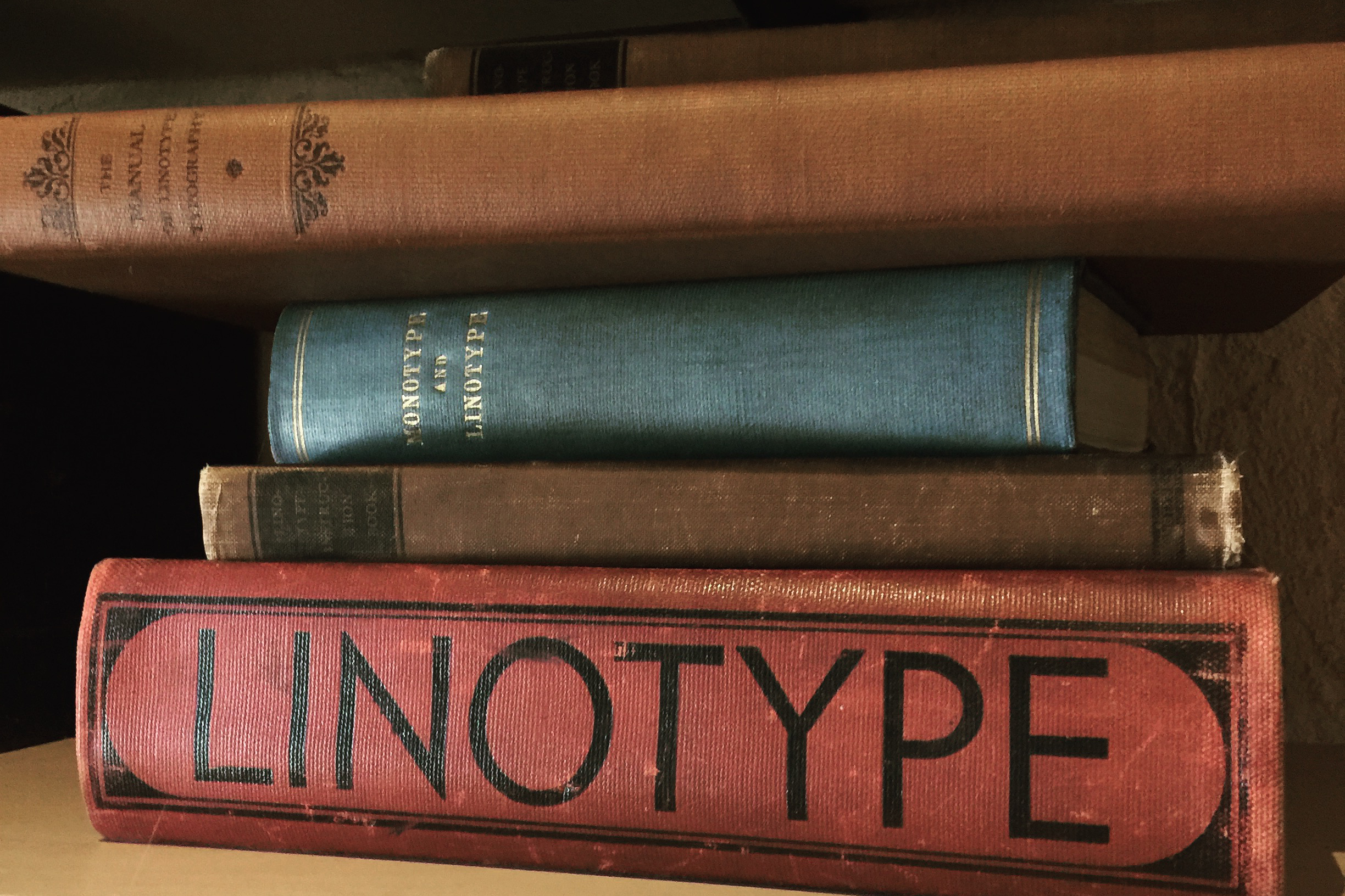 a stack of printing books