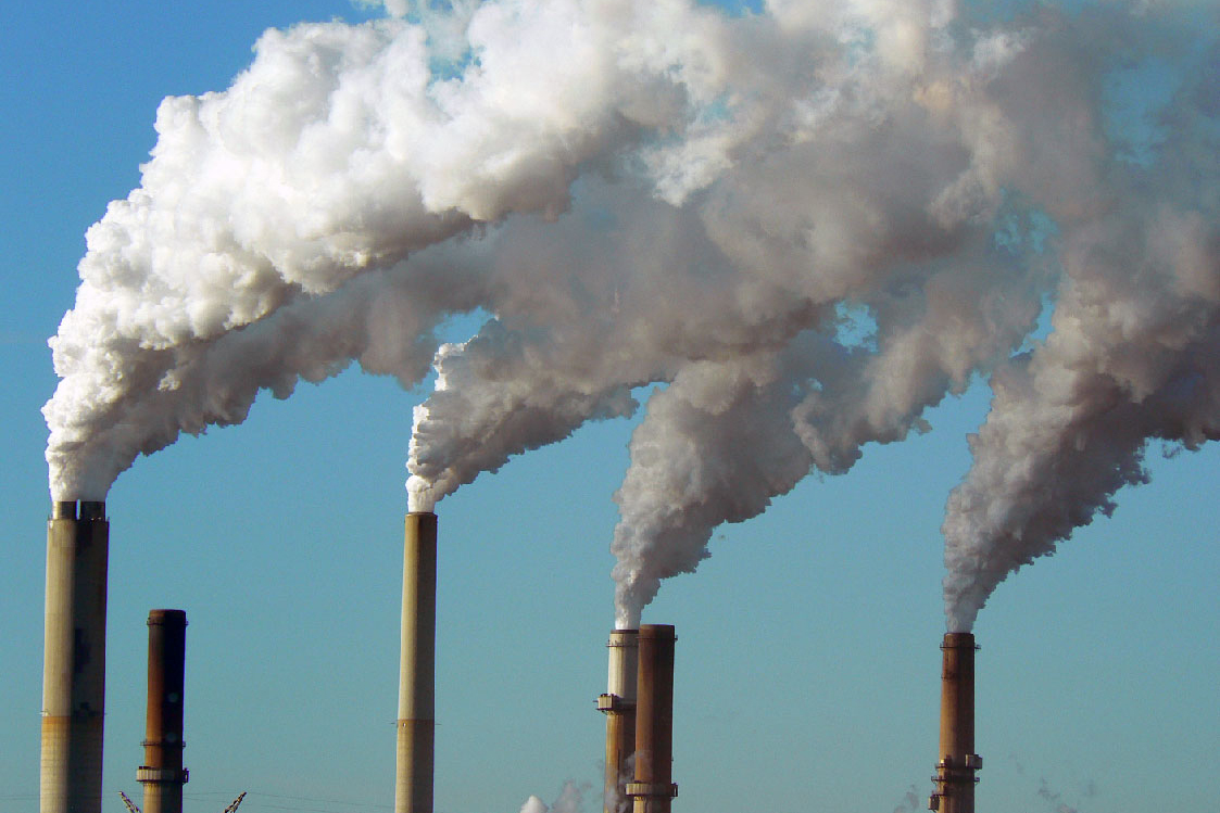 smoke stacks with white smoke